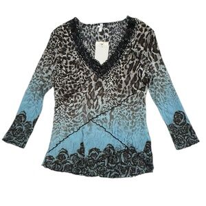 NWT. Lindi top in blue seals. size XS.